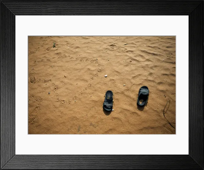 Framed Print : Slippers are pictured at the school compound in Dapchi in the northeastern state of Yobe Framed Print : Slippers are pictured at the school compound in Dapchi in the northeastern state of Yobe