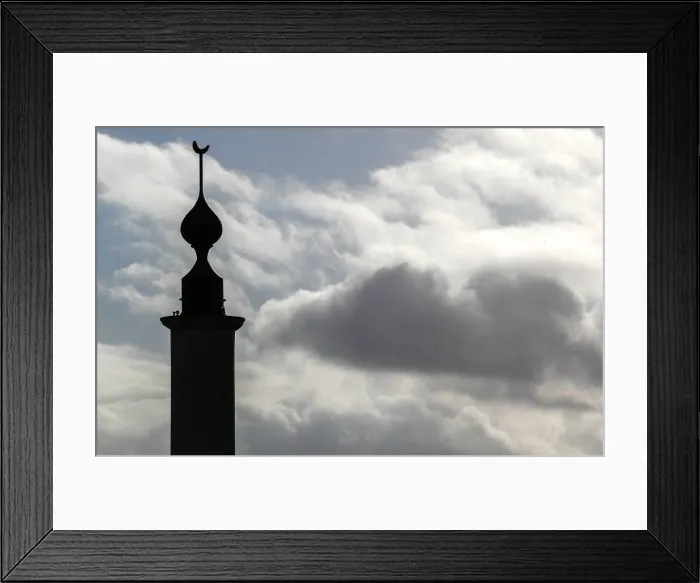 Framed Print : The minaret of Brussels Great Mosque is seen in Brussels Framed Print : The minaret of Brussels Great Mosque is seen in Brussels