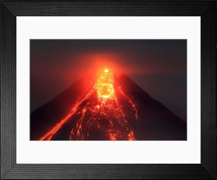 Framed Print : Lava flows from the crater of Mount Mayon volcano during a new eruption in Legazpi city Framed Print : Lava flows from the crater of Mount Mayon volcano during a new eruption in Legazpi city