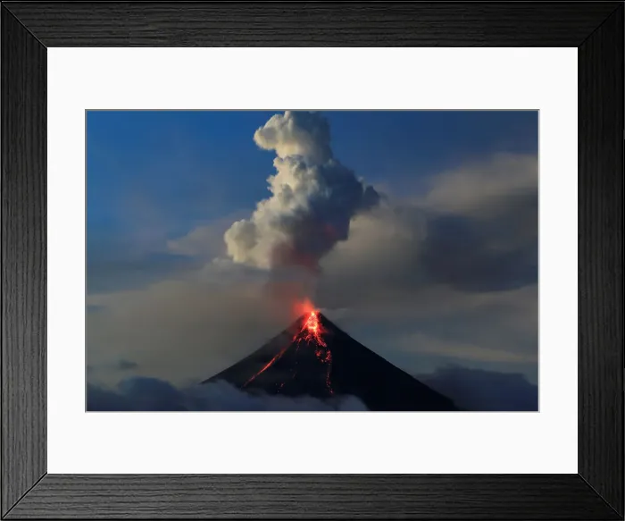 Framed Print : Lava flows from the crater of Mount Mayon volcano during a new eruption in Legazpi city Framed Print : Lava flows from the crater of Mount Mayon volcano during a new eruption in Legazpi city