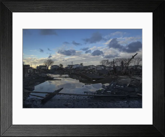 Framed Print : The wreckage of homes devastated by fire and the effects of Hurricane Sandy are seen in Framed Print : The wreckage of homes devastated by fire and the effects of Hurricane Sandy are seen in