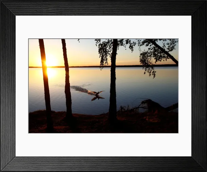 Framed Print : Sun sets behind a lake near the town of Vileika Framed Print : Sun sets behind a lake near the town of Vileika
