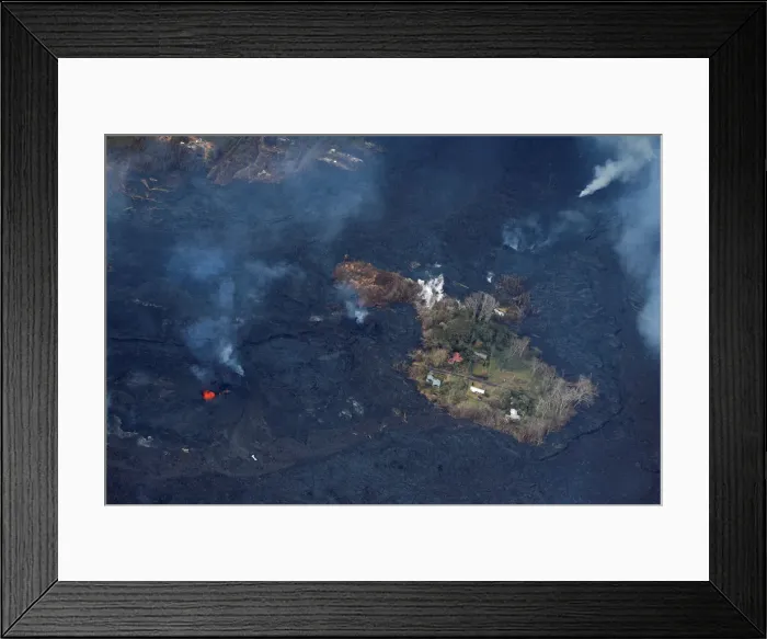 Framed Print : Lava encircles several homes in the Leilani Estates near Pahoa, Hawaii