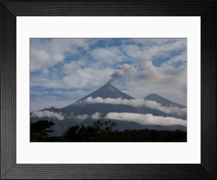 Framed Print : The Wider Image: Woman digs for family lost under Guatemalan volcano