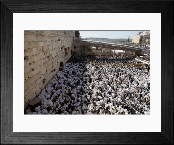 Framed Print : Jewish worshippers are seen from above during the priestly blessing prayer on the holiday