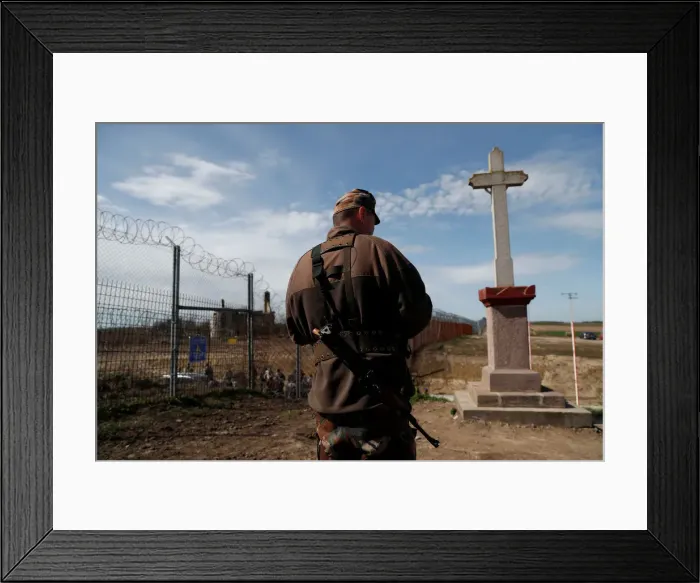 Framed Print : The Wider Image: In Hungary, one fence comes down, another goes up Framed Print : The Wider Image: In Hungary, one fence comes down, another goes up