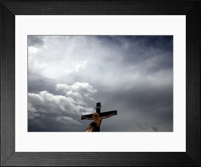 Framed Print : Orthodox faithful attend a ceremony re-enacting Jesus Christs Deposition from the Cross