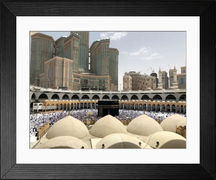 Framed Print : Muslims perform Omrah around the holy Kaaba at the Grand Mosque during the holy fasting Framed Print : Muslims perform Omrah around the holy Kaaba at the Grand Mosque during the holy fasting