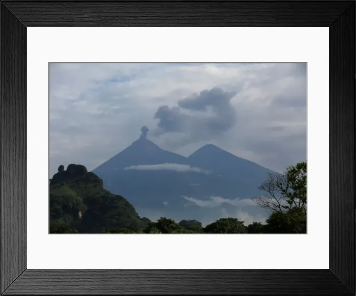 Framed Print : Fuego volcano is seen from San Miguel Los Lotes, in Escuintla Framed Print : Fuego volcano is seen from San Miguel Los Lotes, in Escuintla
