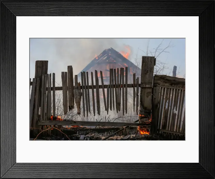 Framed Print : A view shows a summer housing estate fire near the Siberian town of Achinsk Framed Print : A view shows a summer housing estate fire near the Siberian town of Achinsk