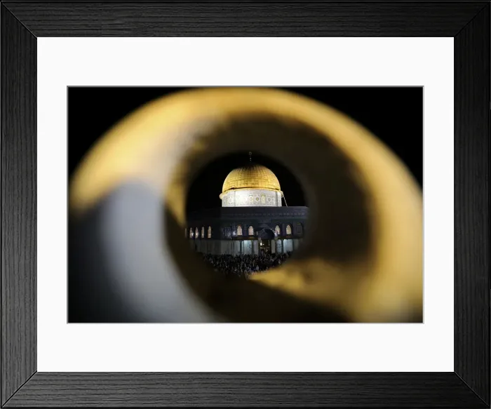 Framed Print : Muslim women pray in front of the Dome of the Rock, on the compound known to Muslims as Framed Print : Muslim women pray in front of the Dome of the Rock, on the compound known to Muslims as