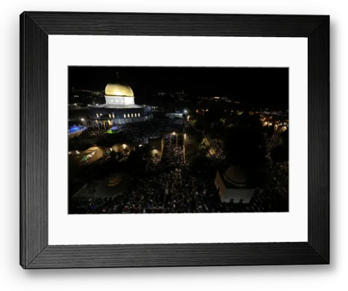 Framed Print : Muslim women pray in front of the Dome of the Rock, on the compound known to Muslims as Framed Print : Muslim women pray in front of the Dome of the Rock, on the compound known to Muslims as
