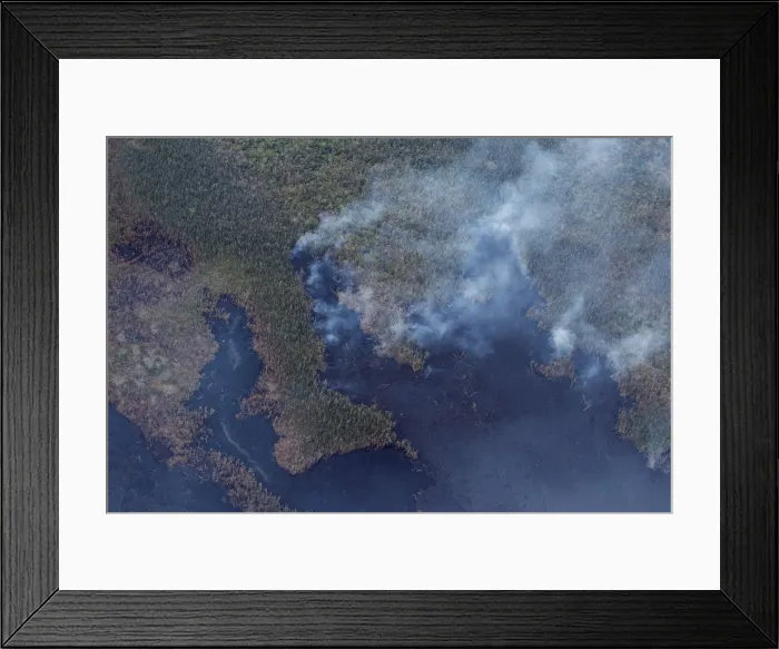 Framed Print : Lava cuts through the Malama Ki area towards the ocean near Kapoho, Hawaii Framed Print : Lava cuts through the Malama Ki area towards the ocean near Kapoho, Hawaii