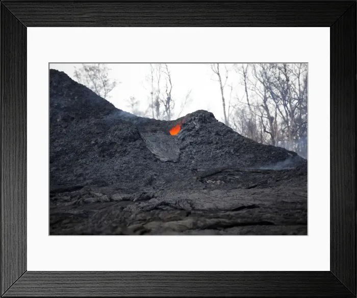Framed Print : A volcanic fissure glows red near Nohea Street, in the Leilani Estates, near Pahoa