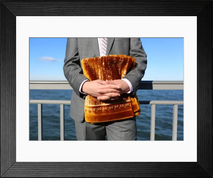 Framed Print : A Muslim man holds his prayer mat at Bensonhurst Park ahead of Eid Al-Fitr prayers to Framed Print : A Muslim man holds his prayer mat at Bensonhurst Park ahead of Eid Al-Fitr prayers to