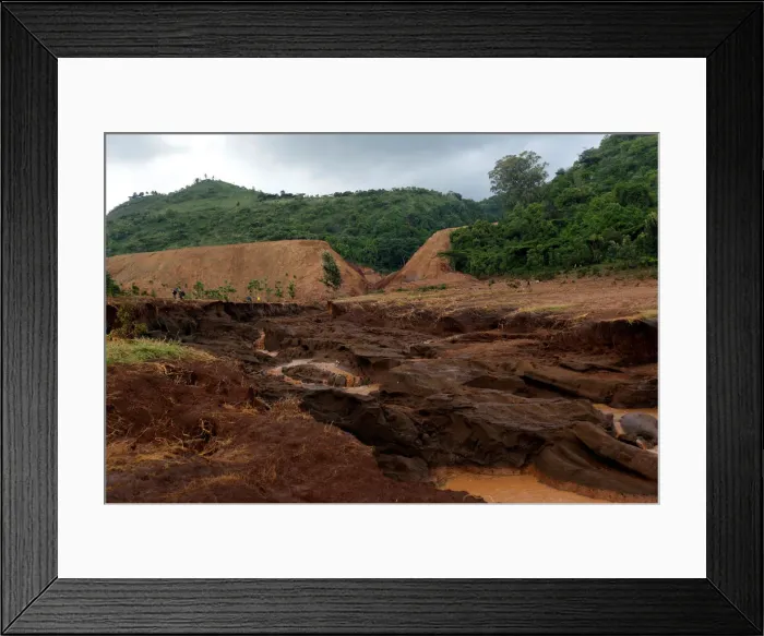 Framed Print : A general view shows the dam that burst its walls, overrunning nearby homes Framed Print : A general view shows the dam that burst its walls, overrunning nearby homes