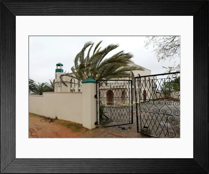 Framed Print : Police tape cordons off a mosque after a knife attack in Malmesbury near Cape Town