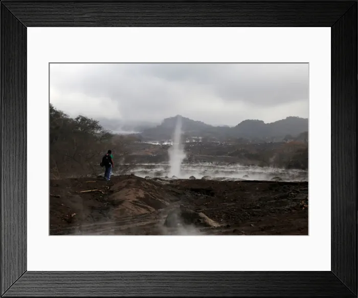 Framed Print : A general view shows an area affected by the eruption of the Fuego volcano in San Miguel