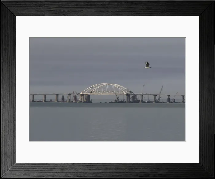 Framed Print : A general view shows a road-and-rail bridge, which is constructed to connect the Russian Framed Print : A general view shows a road-and-rail bridge, which is constructed to connect the Russian