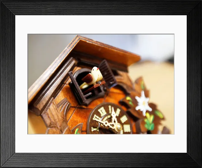 Framed Print : Bird house wall clock named Coucou is pictured in a watchmakers shop in Bordeaux Framed Print : Bird house wall clock named Coucou is pictured in a watchmakers shop in Bordeaux