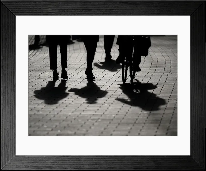 Framed Print : People walk down the street during the start of winter sales in downtown Strasbourg Framed Print : People walk down the street during the start of winter sales in downtown Strasbourg