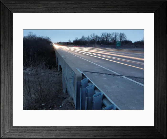 Framed Print : Traffic passes over a bridge for Interstate 270 that crosses Fee Fee Creek in Maryland Framed Print : Traffic passes over a bridge for Interstate 270 that crosses Fee Fee Creek in Maryland