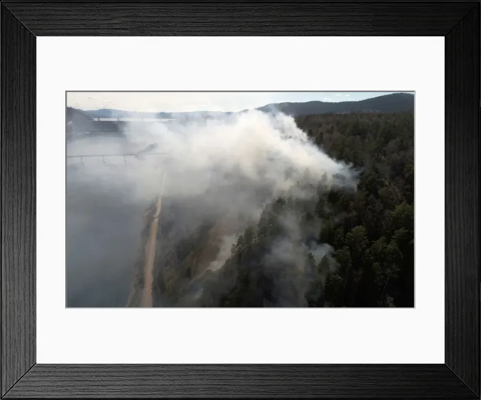 Framed Print : An aerial view shows a forest fire in the Siberian Taiga area outside Krasnoyarsk