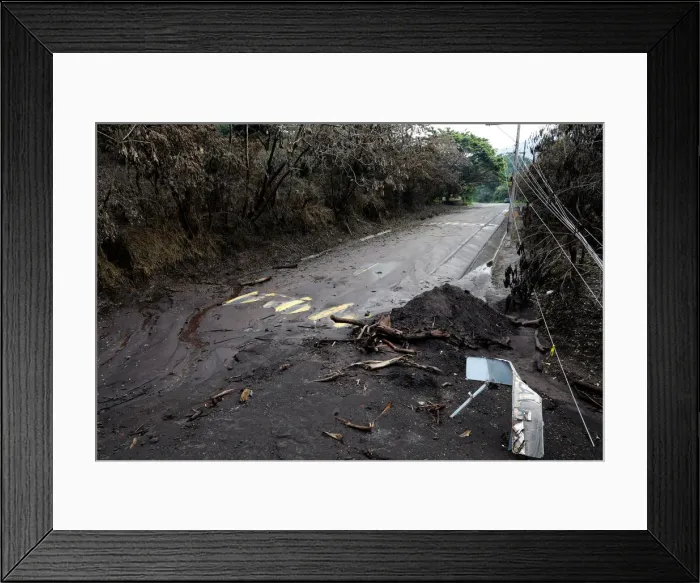 Framed Print : A road affected by a lahar from Fuego volcano is seen in El Rodeo