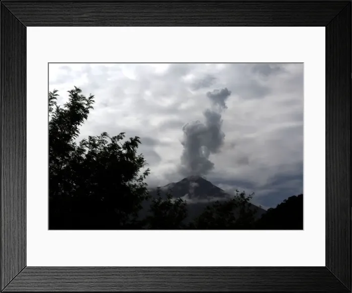 Framed Print : A general view shows the Fuego volcano from Yepocapa in Chimaltenango