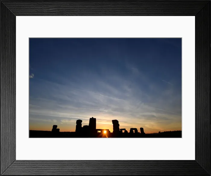 Framed Print : Revellers welcome in the Summer Solstice at Stonehenge stone circle in southwest Britain Framed Print : Revellers welcome in the Summer Solstice at Stonehenge stone circle in southwest Britain