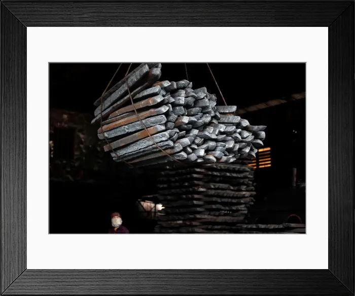 Framed Print : Steel bars are pictured in a mill in Chau Khe village outside Hanoi