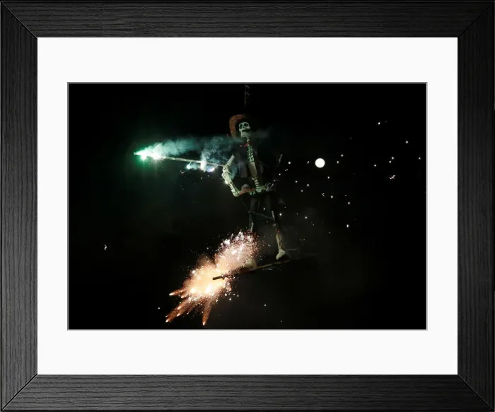 Framed Print : People set fire to an effigy during the traditional burning of Judas on Holy Saturday in Framed Print : People set fire to an effigy during the traditional burning of Judas on Holy Saturday in