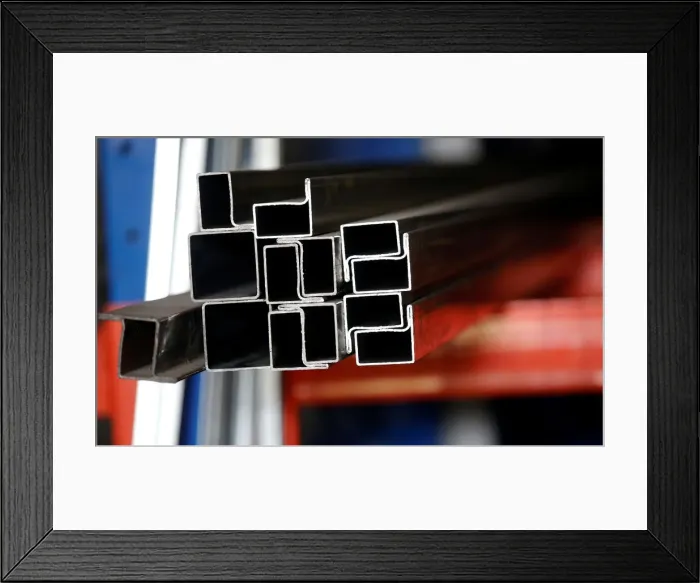 Framed Print : Metal bars are seen at a steel workshop in Marseille Framed Print : Metal bars are seen at a steel workshop in Marseille