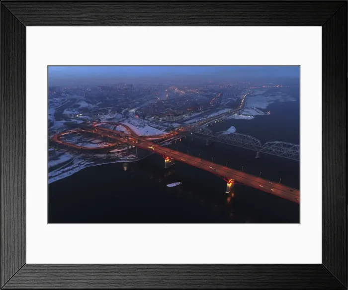 Framed Print : An aerial view shows the illuminated Nikolaevsky highway bridge Framed Print : An aerial view shows the illuminated Nikolaevsky highway bridge