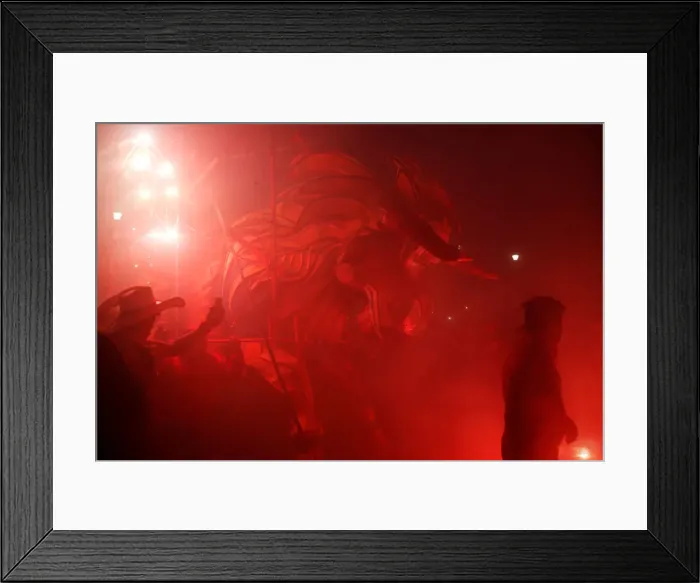 Framed Print : People enjoy fireworks exploding from a traditional bull figure known as El Torito in Framed Print : People enjoy fireworks exploding from a traditional bull figure known as El Torito in