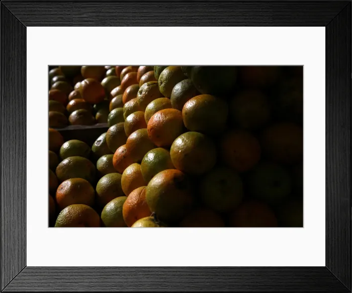 Framed Print : Oranges are displayed for sale at a street market in Rio de Janeiro Framed Print : Oranges are displayed for sale at a street market in Rio de Janeiro