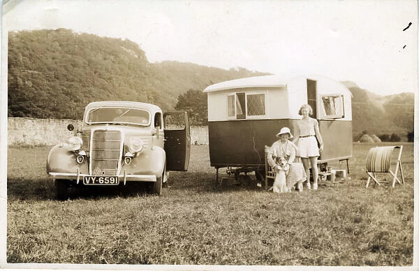 1935 Ford Four-door Sedan Vintage Car with Caravan, England