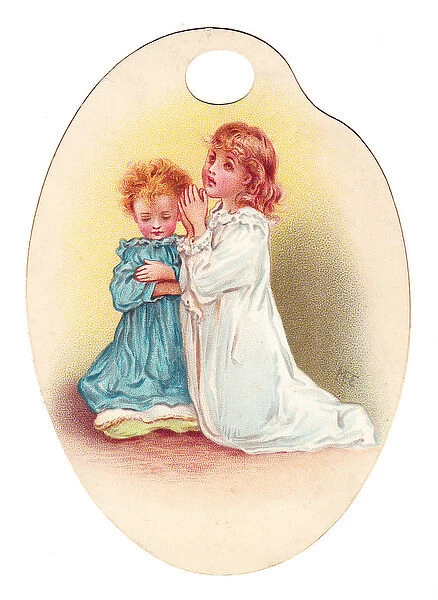 Girl and boy praying on a palette-shaped greetings card