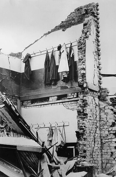 WW2 - Bomb Damage in London - Coats and Hats left on hooks