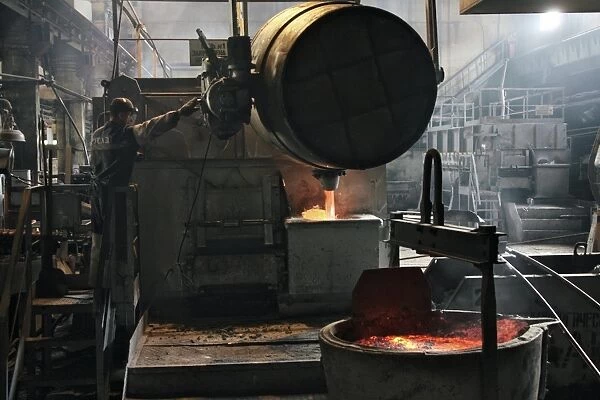 Molten aluminium ore being poured