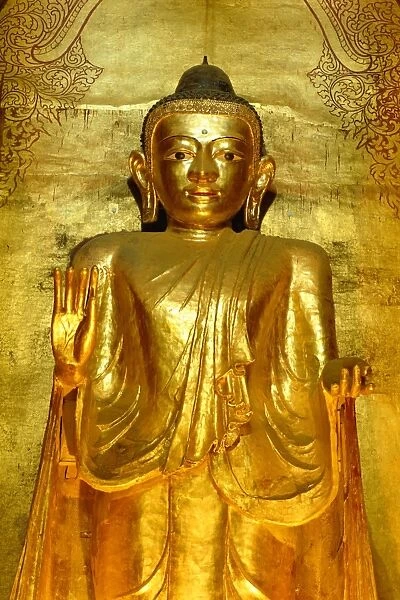 Standing Buddha statue, Ananda Pahto Temple, Bagan (Pagan), Myanmar (Burma)