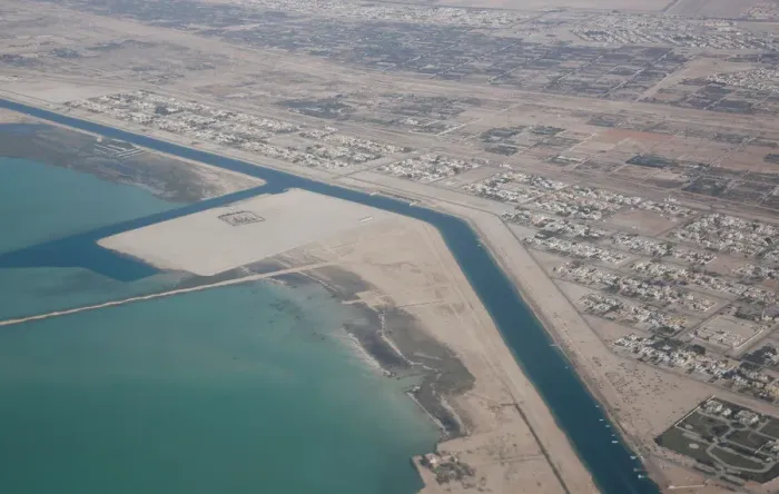 Framed Print : An aerial view of Arabian Gulf with city of Abu Dhabi is pictured through the window of Framed Print : An aerial view of Arabian Gulf with city of Abu Dhabi is pictured through the window of