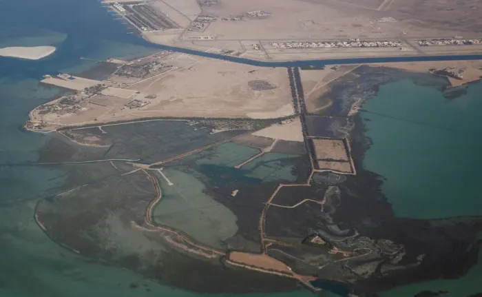 Framed Print : An aerial view of Arabian Gulf with city of Abu Dhabi is pictured through the window of Framed Print : An aerial view of Arabian Gulf with city of Abu Dhabi is pictured through the window of