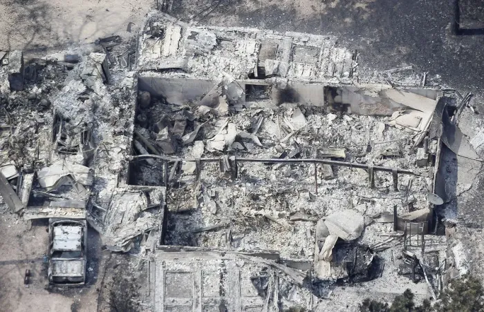 Framed Print : An aerial view of a destroyed house in the aftermath of the Black Forest Fire in Black Framed Print : An aerial view of a destroyed house in the aftermath of the Black Forest Fire in Black