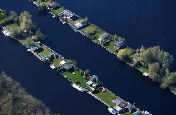 Framed Print : Aerial view of houses surrounded by water near Amsterdam Framed Print : Aerial view of houses surrounded by water near Amsterdam