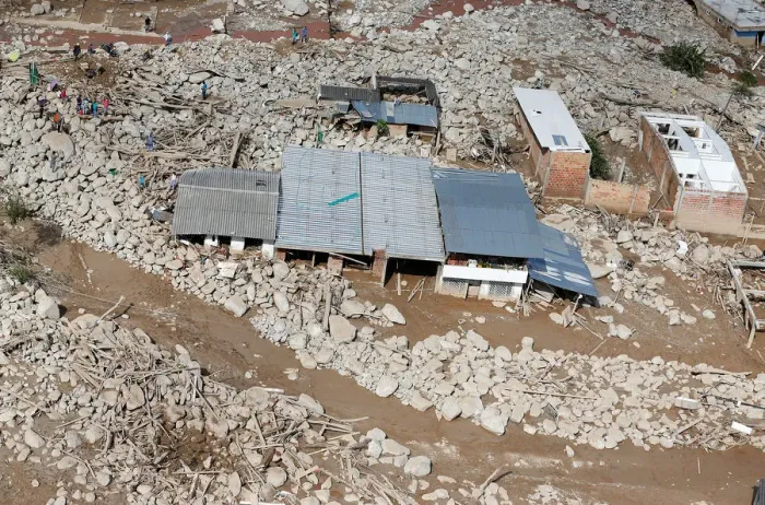 Framed Print : Aerial view of a neighborhood destroyed after flooding and mudslides caused by heavy Framed Print : Aerial view of a neighborhood destroyed after flooding and mudslides caused by heavy