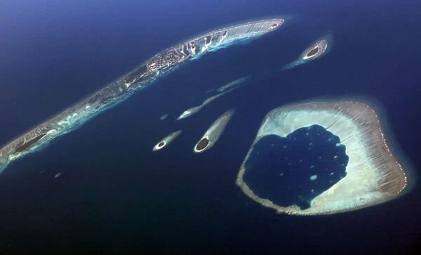 An aerial view shows an atoll in the Maldives