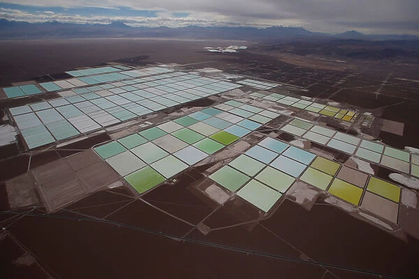 An aerial view shows the brine pools of SQM lithium mine on the Atacama salt flat in the