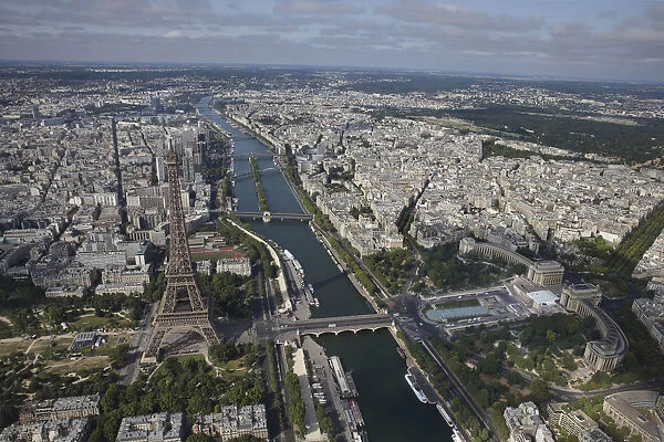 An aerial view shows the Eiffel tower, the Seine River and the Paris skyline