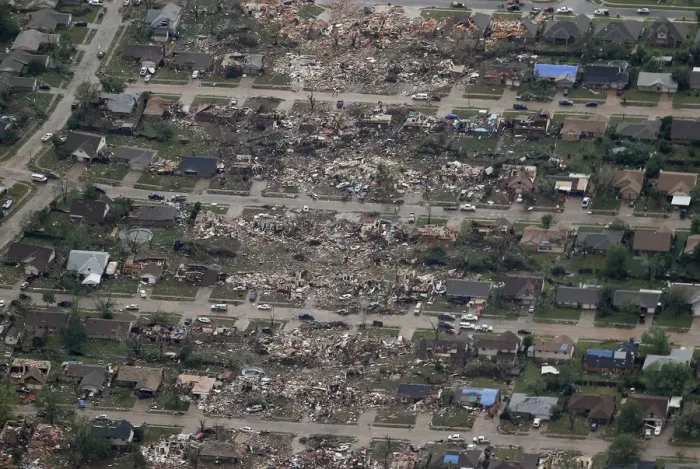 Framed Print : An aerial view shows the path of destruction in the aftermath of a tornado Framed Print : An aerial view shows the path of destruction in the aftermath of a tornado